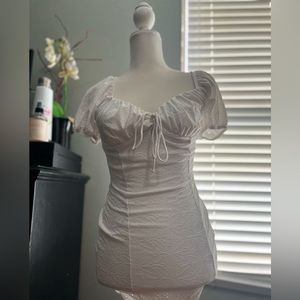 White mini dress, super cute but I didn’t like the way it fit me.